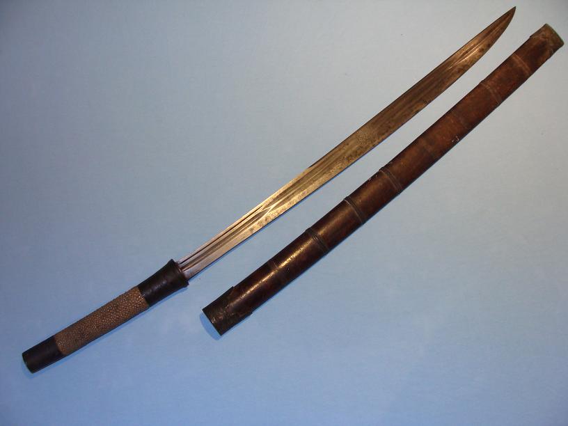 Dha Burma Mid 19th century A very fine fighting sword www.swordsantiqueweapons.com
