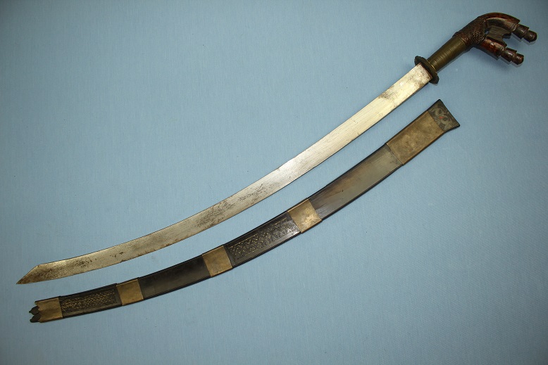 A fine Pakayun Murut fighting sabre Borneo 19th century Dayak sheild www.swordsantiqueweapons.com